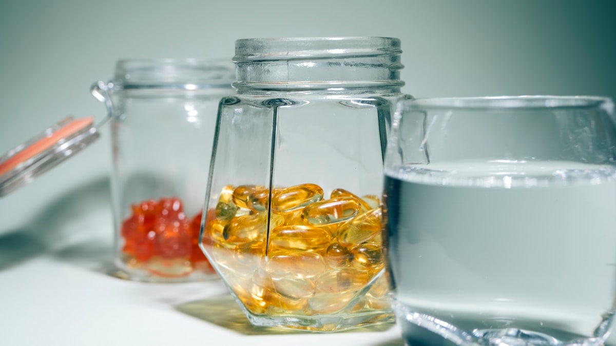 Three glass jars filled with different types of liquid